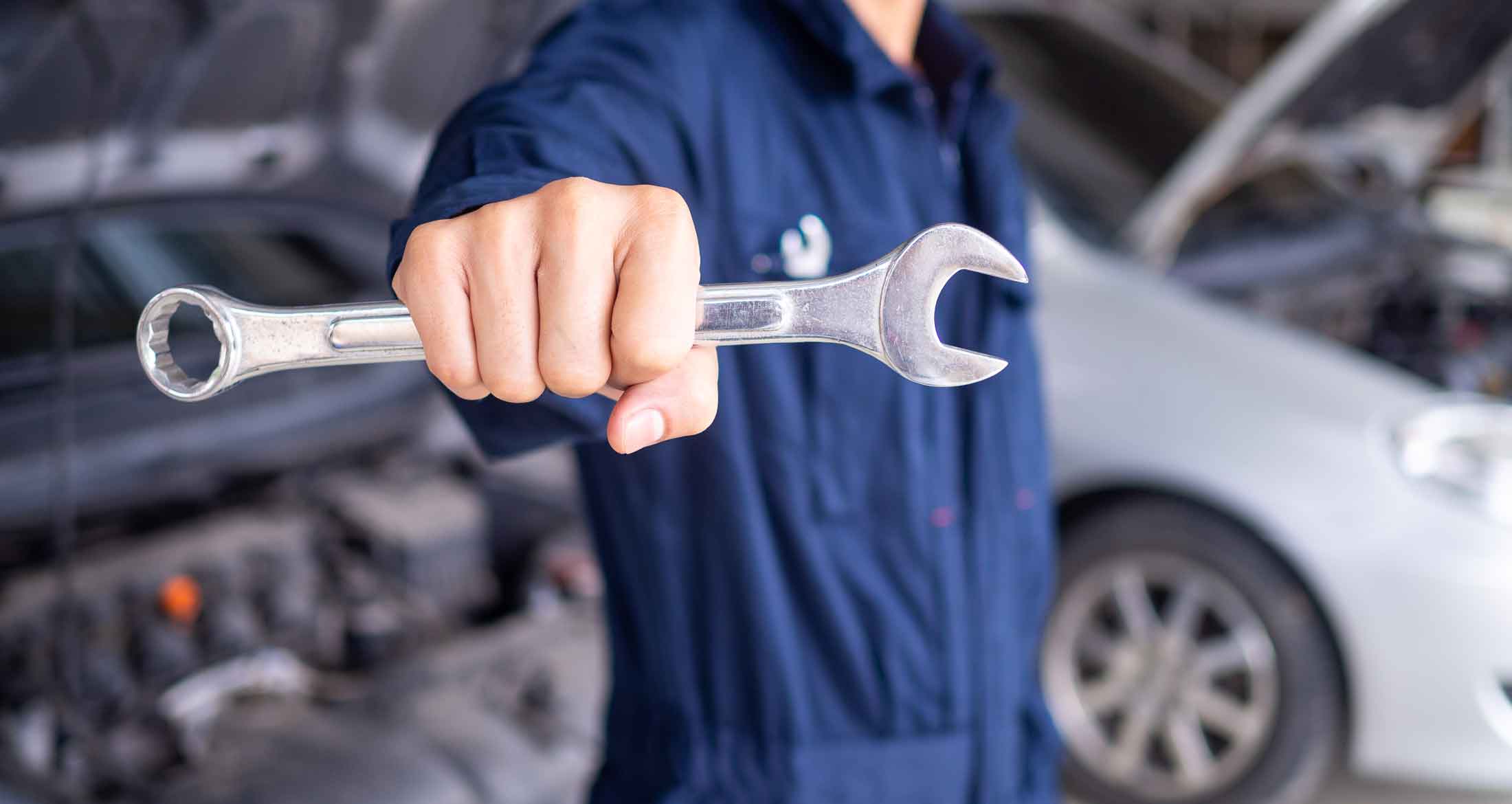 Mechanic holding a wrench