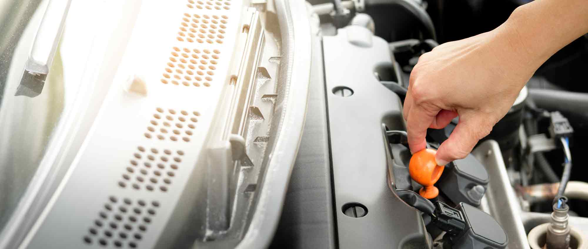 Hand checking engine oil