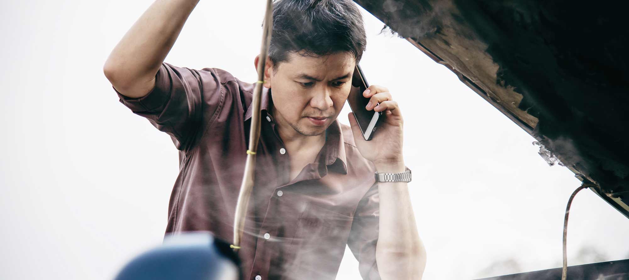 Man calling mobile mechanic in Manchester